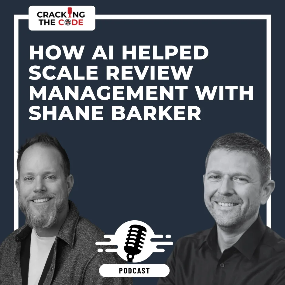 Two smiling men in black and white photos appear below a podcast title that reads, “how ai helped scale review management with shane barker,” with the “cracking the code” podcast logo and a microphone icon.
